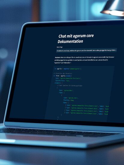 Ein Laptop zeigt die Dokumentation des DIGITAL TOOLKIT in der Cloud mit Codebeispielen für Open Source DMS.